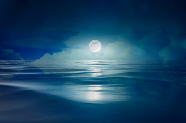 full moon in the sea at night