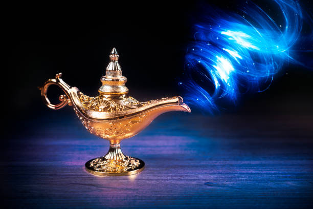 Magic genie lamp with smoke on a dark background