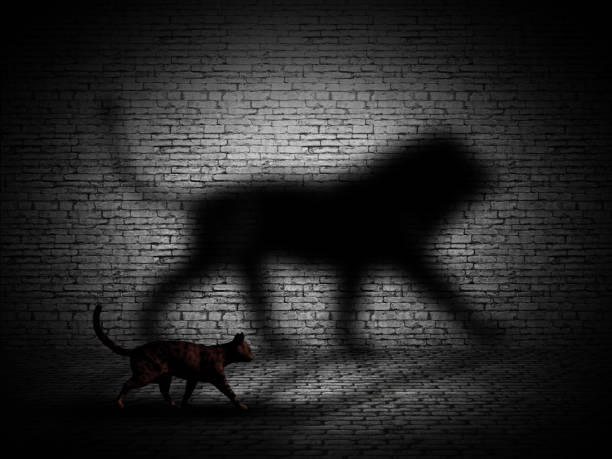 3D render of a cat walking with lion shaped shadow against a brick wall