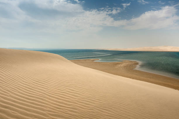 The Inland Sea or Khawr al Udayd in Qatar, with 4x4 tyre tracks