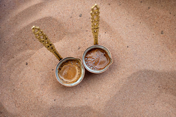 preparing traditional turkish  coffee on the hot sand